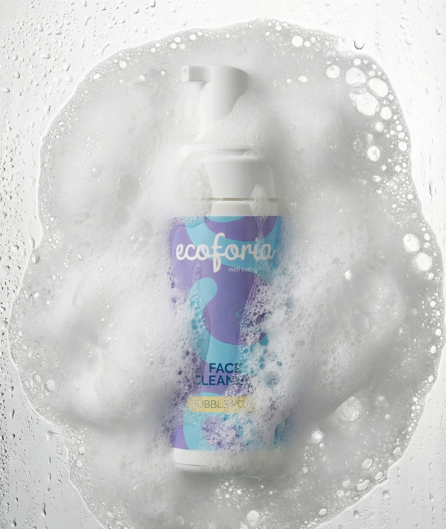 Bottle of ecoforia face wash with bubbles on a light gray background