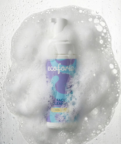Bottle of ecoforia face wash with bubbles on a light gray background